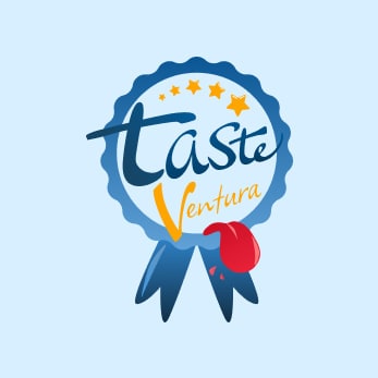 Tweede logo-idee: een blauwe medaille met sterren en linten